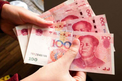 Юань пока уверенно доминирует на валютном рынке и в импорте